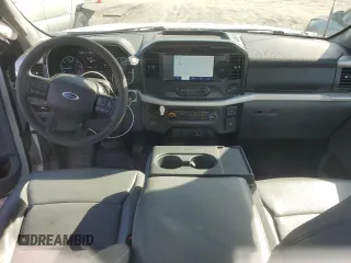 2021 Ford F-150 XL with VIN 1FTMF1CP5MKE21303, listed as a Copart auction lot 56406605 with 93,906 mi miles and Salvage title. Bid and sale history available at DreamBid. Image 8.