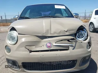 2012 FIAT 500 Sport z VIN 3C3CFFBR8CT131358, wystawiony jako IAAI lot #42073694 z przebiegiem 113 987 mil mil oraz . Historia ofert i sprzedaży dostępna na DreamBid. Obrazek 12.