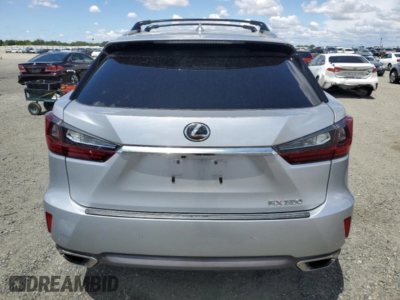 2016 Lexus RX 350 с VIN JTJBZMCA4G2012562, выставлен на аукционе Copart как лот 56843915 с пробегом 106 065 миль миль и Списание • Salvage title. История ставок и продаж доступна на DreamBid. Изображение 6.