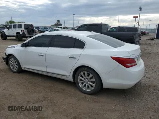 2014 Buick LaCrosse with VIN 1G4GA5GRXEF176101, listed as a Copart auction lot 56921125 with 144,777 mi miles and Salvage title. Bid and sale history available at DreamBid. Image 2.