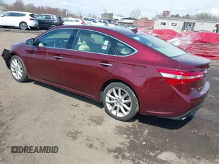 2014 Toyota Avalon Limited with VIN 4T1BK1EB1EU134577, listed as a IAAI auction lot 41994918 with 74,570 mi miles. Bid and sale history available at carsss.com. Image 3.