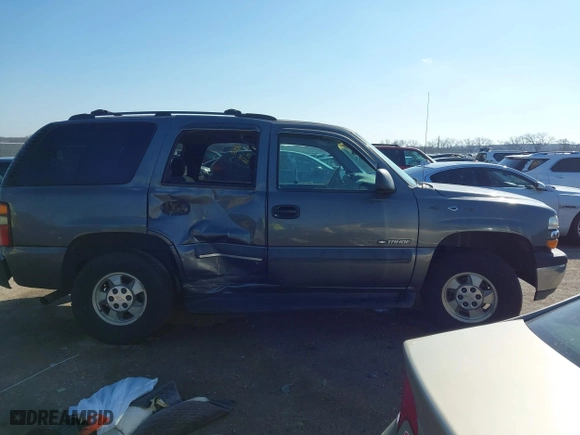 2002 Chevrolet Tahoe LT with VIN 1GNEC13Z12J233208, listed as a IAAI auction lot 41659873 with 238,922 mi miles. Bid and sale history available at carsss.com. Image 13.