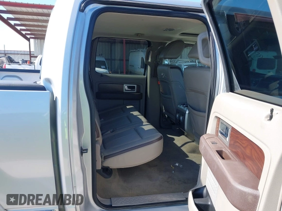 2009 Ford F-150 XL with VIN 1FTPW12V99FB40005, listed as a IAAI auction lot 40804612 with 155,572 mi miles. Bid and sale history available at carsss.com. Image 8.