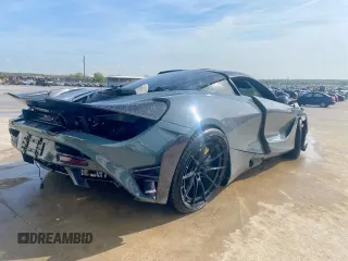 2018 McLaren 720S z VIN SBM14DCA3JW001315, wystawiony jako Copart lot #78193064 z przebiegiem Nie podano mil oraz Szkody całkowita. Historia ofert i sprzedaży dostępna na DreamBid. Obrazek 3.
