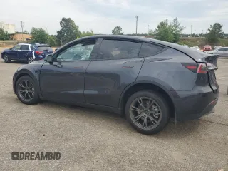 2024 Tesla Model Y z VIN 7SAYGDED4RA331714, wystawiony jako Copart lot #57043915 z przebiegiem Nie podano mil oraz Szkoda całkowita • Salvage title. Historia ofert i sprzedaży dostępna na DreamBid. Obrazek 2.