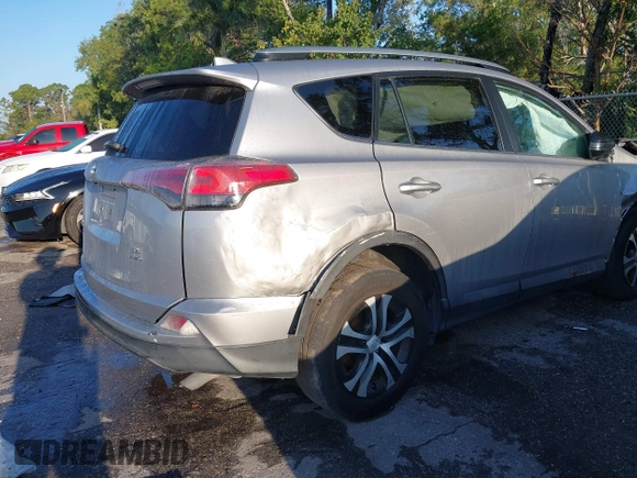 2017 Toyota RAV4 LE with VIN 2T3BFREV1HW607984, listed as a IAAI auction lot 41878970 with 136,941 mi miles and . Bid and sale history available at DreamBid. Image 19.