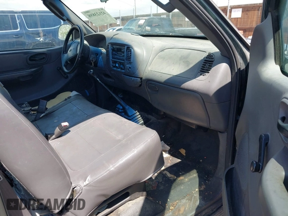 2002 Ford F-150 XL with VIN 1FTRF18232NB18258, listed as a IAAI auction lot 42123898 with 152,214 mi miles and . Bid and sale history available at DreamBid. Image 5.
