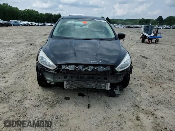 2018 Ford Focus SE z VIN 1FADP3F28JL319269, wystawiony jako Copart lot #59604555 z przebiegiem 167 726 mil mil oraz Szkoda całkowita • Salvage title. Historia ofert i sprzedaży dostępna na DreamBid. Obrazek 13.