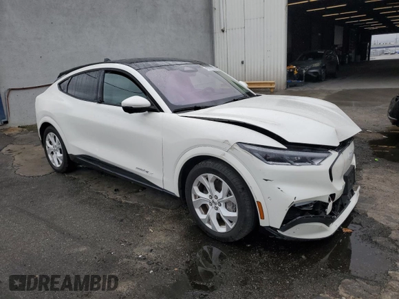 2022 Ford Mustang Mach-E Premium with VIN 3FMTK3R71NMA31671, listed as a Copart auction lot 43791535 with 22,703 mi miles and Salvage Title. Bid and sale history available at DreamBid. Image 4.