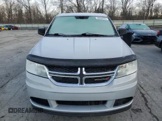 2013 Dodge Journey American Value with VIN 3C4PDCAB9DT604157, listed as a Copart auction lot 48206675 with 158,392 mi miles and Salvage Title. Bid and sale history available at DreamBid. Image 5.