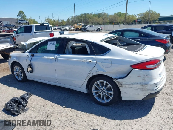 2020 Ford Fusion SE z VIN 3FA6P0LU8LR266686, wystawiony jako IAAI lot #41790126 z przebiegiem 95 314 mil mil oraz . Historia ofert i sprzedaży dostępna na DreamBid. Obrazek 14.
