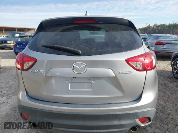 2015 Mazda CX-5 Touring with VIN JM3KE2CYXF0435583, listed as a IAAI auction lot 41737810 with 107,270 mi miles and . Bid and sale history available at DreamBid. Image 16.