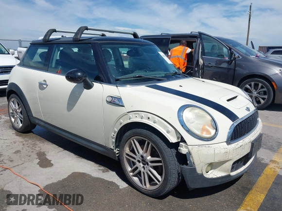 2007 MINI Hardtop S with VIN WMWMF73567TL89619, listed as a IAAI auction lot 42807828 with 201,371 mi miles and . Bid and sale history available at DreamBid. Image 1.