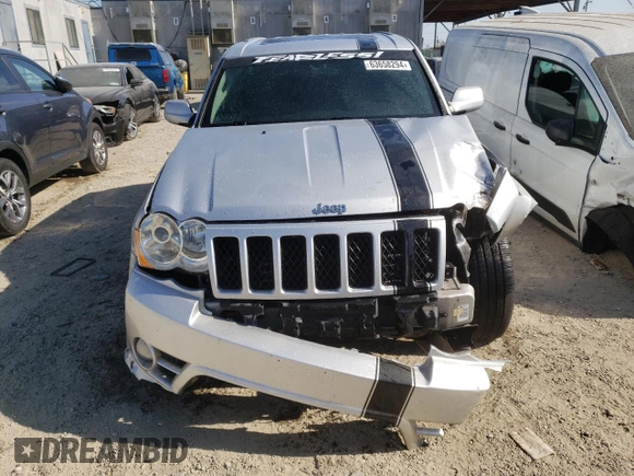 2008 Jeep Grand Cherokee SRT-8 with VIN 1J8HR78358C192213, listed as a Copart auction lot 63658294 with 126,140 mi miles and Salvage Title. Bid and sale history available at carsss.com. Image 5.