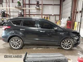 2015 Ford Escape SE with VIN 1FMCU9G9XFUA70029, listed as a IAAI auction lot 41673827 with 82,043 mi miles. Bid and sale history available at carsss.com. Image 14.