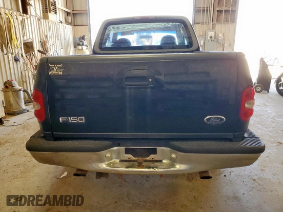 1998 Ford F-150 XL with VIN 1FTZX0725WKB83760, listed as a Copart auction lot 60988225 with 243,361 mi miles and Salvage title. Bid and sale history available at DreamBid. Image 6.