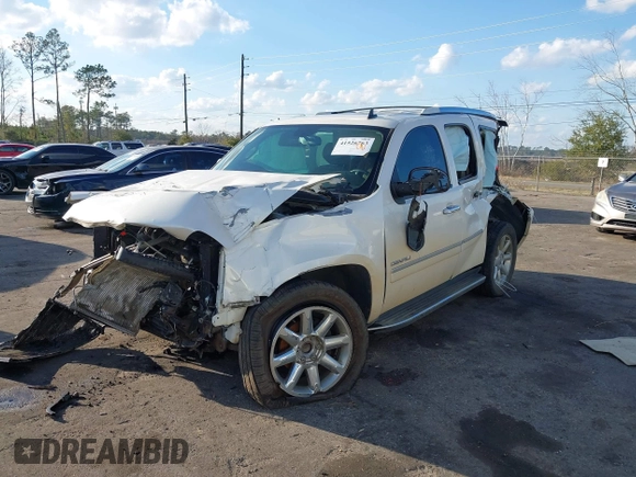 2013 GMC Yukon Denali with VIN 1GKS1EEF6DR278035, listed as a IAAI auction lot 41526763 with 149,815 mi miles. Bid and sale history available at carsss.com. Image 2.