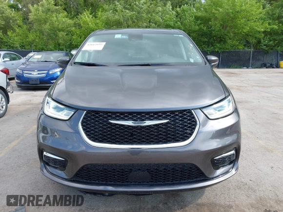 2023 Chrysler Pacifica Touring L with VIN 2C4RC1BG6PR612749, listed as a IAAI auction lot 42612932 with 69,931 mi miles and . Bid and sale history available at DreamBid. Image 12.