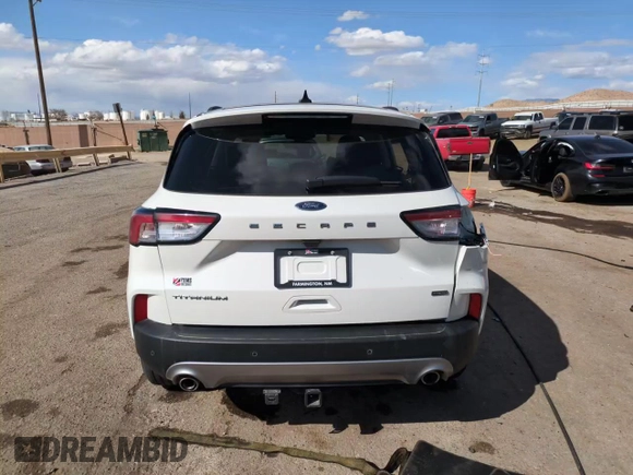 2021 Ford Escape Titanium Hybrid z VIN 1FMCU0DZ2MUB02954, wystawiony jako Copart lot #50558285 z przebiegiem 25 612 mil mil oraz Szkoda całkowita • Salvage title. Historia ofert i sprzedaży dostępna na DreamBid. Obrazek 14.
