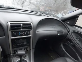 2004 Ford Mustang GT Deluxe z VIN 1FAFP45X74F128442, wystawiony jako IAAI lot #41580930 z przebiegiem 100 801 mil mil oraz . Historia ofert i sprzedaży dostępna na DreamBid. Obrazek 5.