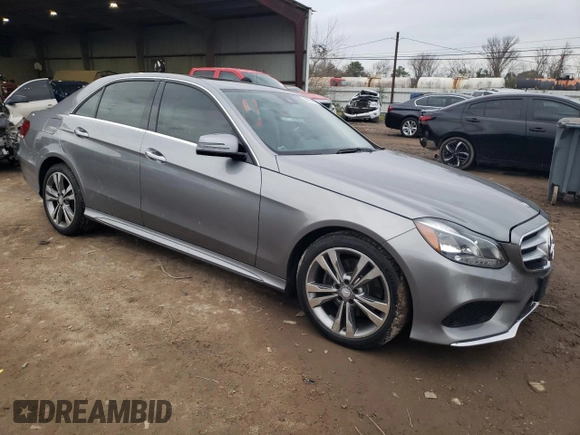 2014 Mercedes-Benz E 350 Sport with VIN WDDHF5KB2EA854735, listed as a Copart auction lot 88583415 with 99,456 mi miles and Salvage title. Bid and sale history available at DreamBid. Image 4.