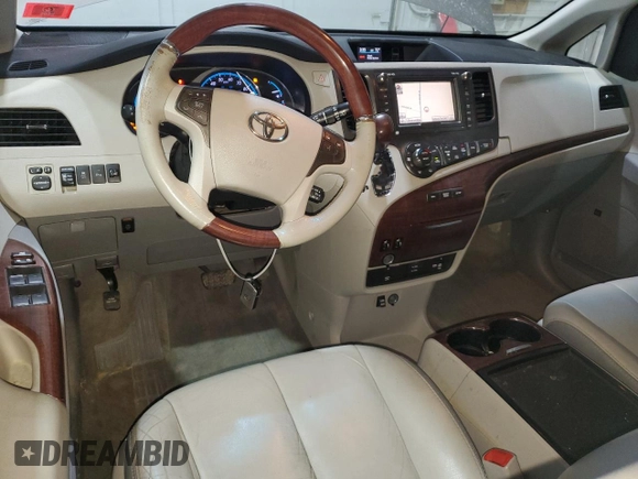 2012 Toyota Sienna XLE с VIN 5TDDK3DC5CS037368, выставлен на аукционе Copart как лот 49626985 с пробегом 164 431 миль миль и Списание • Salvage title. История ставок и продаж доступна на DreamBid. Изображение 8.