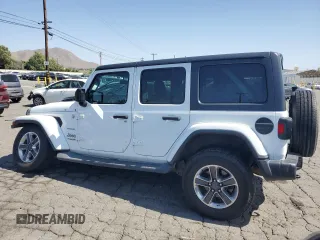 2019 Jeep Wrangler Unlimited Sahara с VIN 1C4HJXEN4KW593522, выставлен на аукционе Copart как лот 57528955 с пробегом 77 382 миль миль и Списание • Salvage title. История ставок и продаж доступна на DreamBid. Изображение 2.