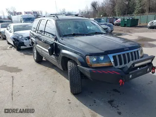 2004 Jeep Grand Cherokee Limited with VIN 1J4GW58N74C120435, listed as a IAAI auction lot 41815094 with 193,056 mi miles. Bid and sale history available at carsss.com. Image 1.