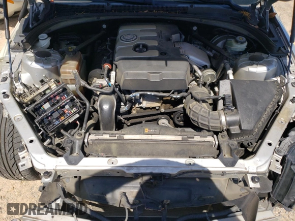 2014 Cadillac ATS Standard RWD z VIN 1G6AA5RX1E0167721, wystawiony jako Copart lot #53982705 z przebiegiem 160 328 mil mil oraz Szkoda całkowita • Salvage title. Historia ofert i sprzedaży dostępna na DreamBid. Obrazek 11.
