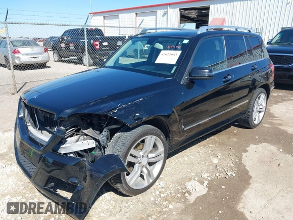 2012 Mercedes-Benz GLK GLK 350 with VIN WDCGG8HB6CF841198, listed as a IAAI auction lot 42021083 with 162,930 mi miles. Bid and sale history available at carsss.com. Image 2.