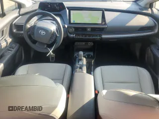 2024 Toyota Prius LE with VIN JTDADABU8R3020720, listed as a Copart auction lot 60815005 with 2,594 mi miles and Salvage title. Bid and sale history available at DreamBid. Image 8.