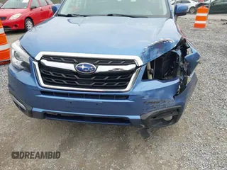 2017 Subaru Forester Touring with VIN JF2SJAWC1HH443799, listed as a IAAI auction lot 41943045 with 122,213 mi miles and . Bid and sale history available at DreamBid. Image 12.