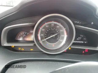 2014 Mazda 3 i Grand Touring z VIN JM1BM1M7XE1101669, wystawiony jako Copart lot #56504335 z przebiegiem 94 832 mil mil oraz Szkoda całkowita • Salvage title. Historia ofert i sprzedaży dostępna na DreamBid. Obrazek 9.