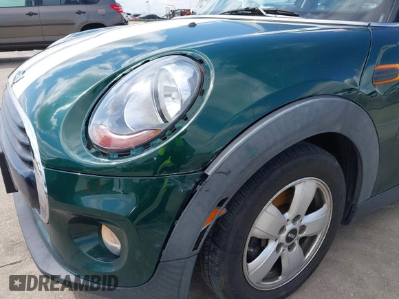 2016 MINI Hardtop 4 Door with VIN WMWXU1C52G2D10035, listed as a IAAI auction lot 42190544 with 106,383 mi miles and . Bid and sale history available at DreamBid. Image 19.