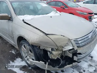2009 Ford Fusion SEL with VIN 3FAHP08ZX9R107528, listed as a IAAI auction lot 41634988 with 113,352 mi miles. Bid and sale history available at carsss.com. Image 6.