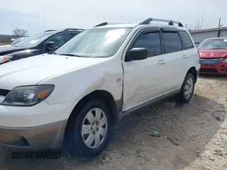 2004 Mitsubishi Outlander LS with VIN JA4LZ31F04U060022, listed as a IAAI auction lot 41775408 with 83,515 mi miles. Bid and sale history available at carsss.com. Image 6.