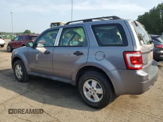 2008 Ford Escape XLS with VIN 1FMCU02Z38KA28478, listed as a Copart auction lot 62279955 with 166,124 mi miles and Salvage title. Bid and sale history available at DreamBid. Image 2.