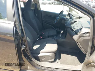 2014 Ford Fiesta S с VIN 3FADP4TJXEM106233, выставлен на аукционе IAAI как лот 42138608 с пробегом 107 873 миль миль и . История ставок и продаж доступна на DreamBid. Изображение 5.