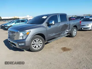2020 Nissan Titan Platinum Reserve with VIN 1N6AA1EF8LN512582, listed as a IAAI auction lot 42236611 with 18,375 mi miles and . Bid and sale history available at DreamBid. Image 2.