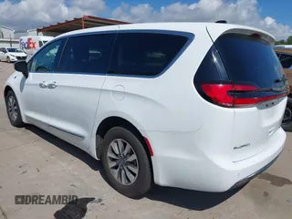 2023 Chrysler Pacifica Hybrid Limited with VIN 2C4RC1S75PR559106, listed as a IAAI auction lot 42613325 with 62,749 mi miles and . Bid and sale history available at DreamBid. Image 3.
