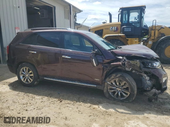 2012 Kia Sorento SX z VIN 5XYKWDA29CG301363, wystawiony jako Copart lot #55954815 z przebiegiem 83 206 mil mil oraz Szkoda całkowita • Salvage title. Historia ofert i sprzedaży dostępna na DreamBid. Obrazek 4.