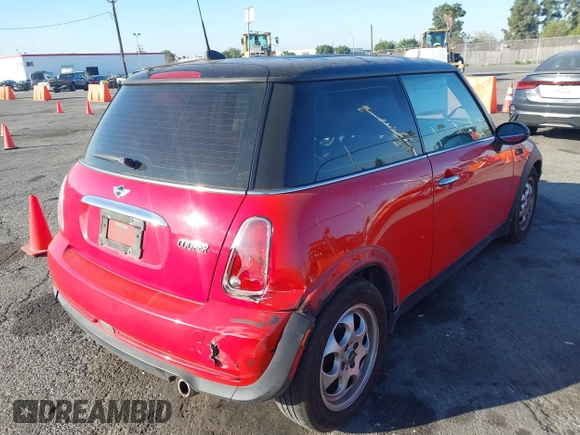 2005 MINI Hardtop with VIN WMWRC33455TJ66323, listed as a IAAI auction lot 41868311 with 122,398 mi miles and . Bid and sale history available at DreamBid. Image 4.