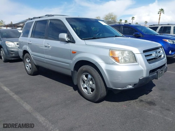 2007 Honda Pilot EX-L with VIN 5FNYF28677B005956, listed as a IAAI auction lot 41948401 with 185,599 mi miles. Bid and sale history available at carsss.com. Image 1.