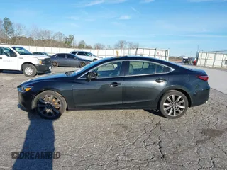 2018 Mazda Mazda6 Touring with VIN JM1GL1VM4J1307304, listed as a IAAI auction lot 41556563 with 173,739 mi miles. Bid and sale history available at carsss.com. Image 14.