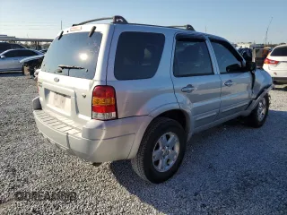 2007 Ford Escape Limited with VIN 1FMYU04187KA40993, listed as a Copart auction lot 88273655 with 209,209 mi miles and Salvage title. Bid and sale history available at DreamBid. Image 3.