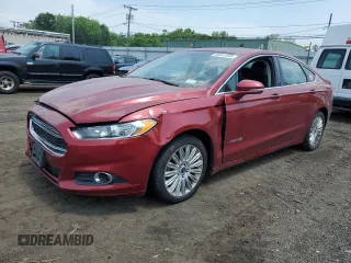 2013 Ford Fusion SE Hybrid with VIN 3FA6P0LUXDR335590, listed as a Copart auction lot 60541395 with 121,975 mi miles and Salvage title. Bid and sale history available at DreamBid. Image 1.