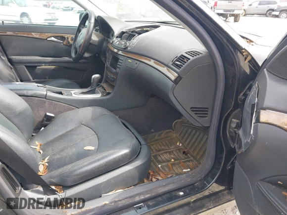 2004 Mercedes-Benz E-Class 5.0L with VIN WDBUF70J64A489519, listed as a IAAI auction lot 41675167 with 226,361 mi miles. Bid and sale history available at carsss.com. Image 5.