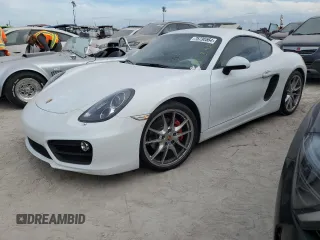 2014 Porsche Cayman S с VIN WP0AB2A84EK191321, выставлен на аукционе Copart как лот 75730564 с пробегом 28 435 миль миль и Списание • Salvage title. История ставок и продаж доступна на DreamBid. Изображение 1.