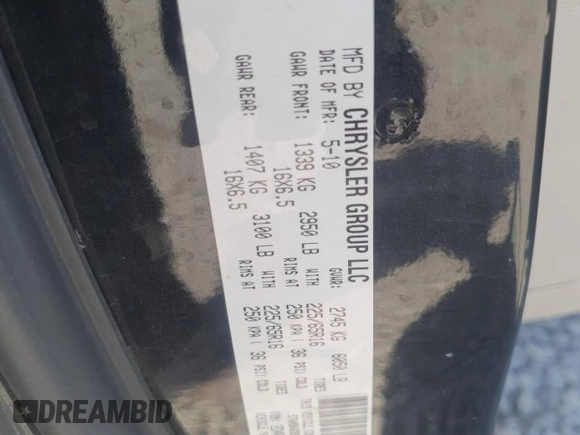 2010 Dodge Grand Caravan with VIN 2D4RN5D1XAR323622, listed as a Copart auction lot 52638465 with 158,491 mi miles and Salvage Title. Bid and sale history available at DreamBid. Image 13.