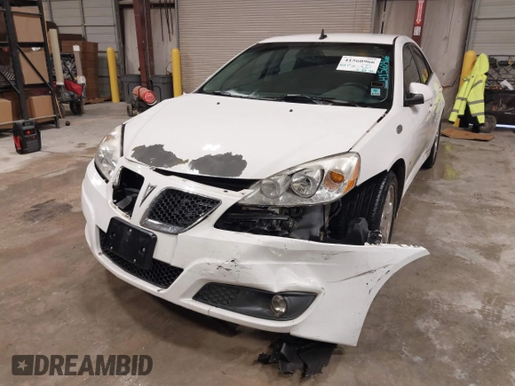 2009 Pontiac G6 1SB z VIN 1G2ZJ57K494243961, wystawiony jako IAAI lot #41560966 z przebiegiem 210 819 mil mil oraz . Historia ofert i sprzedaży dostępna na DreamBid. Obrazek 6.